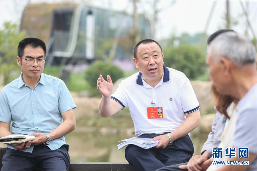 （新華全媒頭條·兩會精神看落實·圖文互動）（2）整體謀劃、系統(tǒng)升級、全面提升——落實全國兩會精神織牢織密公共衛(wèi)生防護網